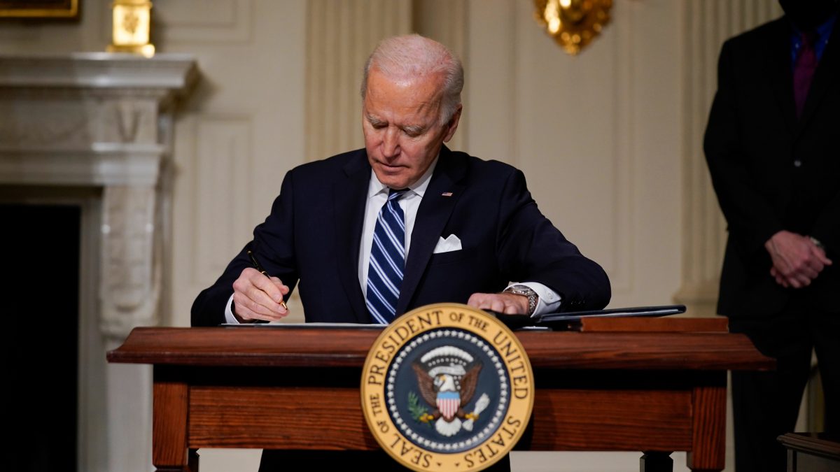 President+Joe+Biden+signs+an+executive+order+on+climate+change%2C+in+the+State+Dining+Room+of+the+White+House%2C+Wednesday%2C+Jan.+27%2C+2021%2C+in+Washington.+%28AP+Photo%2FEvan+Vucci%29